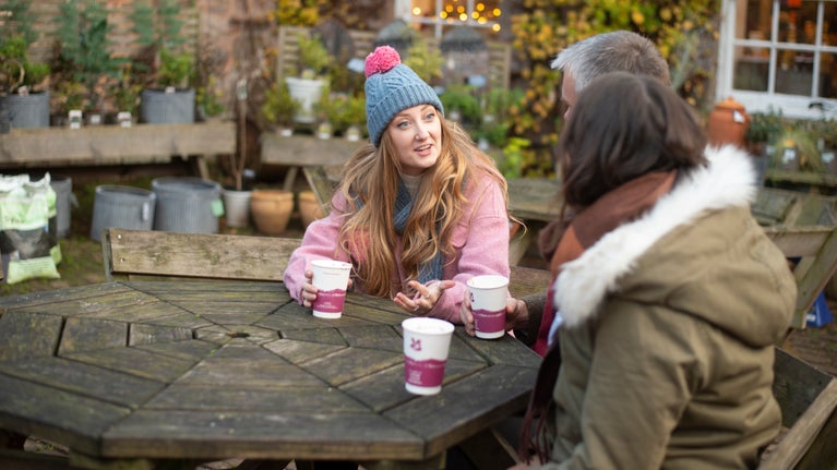 Visitors enjoying hot chocolate at Killerton, Devon